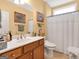 Bathroom boasting natural light, a vanity with ample counter space, and neutral finishes at 1141 Pebble Creek Ln, Locust Grove, GA 30248