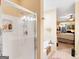 Bright bathroom with a walk-in shower and a soaking tub is visible at 1141 Pebble Creek Ln, Locust Grove, GA 30248