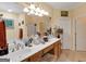 Bright bathroom featuring a double vanity, modern fixtures, and ample counter space for convenience and style at 1141 Pebble Creek Ln, Locust Grove, GA 30248