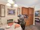 Cozy dining area with wainscoting and wood cabinets at 1141 Pebble Creek Ln, Locust Grove, GA 30248