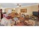 Comfortable living room with hardwood floors, ornate furniture and a cozy atmosphere at 1141 Pebble Creek Ln, Locust Grove, GA 30248