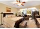 Spacious primary bedroom with columns, lots of furniture and room for relaxing at 1141 Pebble Creek Ln, Locust Grove, GA 30248