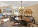 Bright sunroom with vaulted ceilings, lots of windows and natural light at 1141 Pebble Creek Ln, Locust Grove, GA 30248