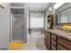 Bathroom with soaking tub, shower, and spacious vanity at 243 Kensington Trce, Stockbridge, GA 30281