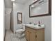 Cozy bathroom featuring a vanity with storage, a toilet, and a shower with a curtain at 1234 Coweta Heard Rd, Hogansville, GA 30230