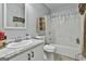 Cozy bathroom with a single vanity, toilet, and shower/tub combination at 1234 Coweta Heard Rd, Hogansville, GA 30230