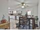 Charming kitchen and dining area featuring ample storage and a cozy dining table at 1234 Coweta Heard Rd, Hogansville, GA 30230