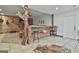 Unique living room with a decorative bar, rustic accents, and an inviting atmosphere at 1234 Coweta Heard Rd, Hogansville, GA 30230