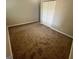 Spacious bedroom with a closet and neutral decor at 1466 Pine Log Ne Rd # A, Conyers, GA 30012