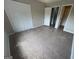 Bedroom featuring neutral walls, carpet, with closet space at 1466 Pine Log Ne Rd # A, Conyers, GA 30012