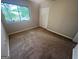 Inviting bedroom featuring natural light and a view to the outdoors at 1466 Pine Log Ne Rd # A, Conyers, GA 30012