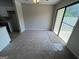 Cozy dining area adjacent to the kitchen, featuring sliding glass doors and neutral carpet at 1466 Pine Log Ne Rd # A, Conyers, GA 30012