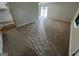 Bright living room featuring neutral carpet, and sliding glass doors to the outdoor patio at 1466 Pine Log Ne Rd # A, Conyers, GA 30012