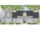 Rendering of a home exterior featuring a gray facade, a covered porch, and manicured landscaping at 1715 Crumbley Rd # 2, Mcdonough, GA 30252