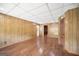 Basement features paneled walls, hard surface flooring, and two closets at 6369 Havenridge Dr, Riverdale, GA 30274