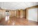 Basement featuring wood paneling, hard surface flooring and multiple closets at 6369 Havenridge Dr, Riverdale, GA 30274