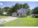 Attractive two-story home featuring a spacious driveway and green lawn at 6369 Havenridge Dr, Riverdale, GA 30274