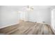 Bright living room with modern vinyl flooring and ample natural light at 6369 Havenridge Dr, Riverdale, GA 30274