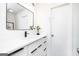 Bathroom boasts a sleek vanity with modern fixtures and a stylish mirror at 8479 Alden Dr, Riverdale, GA 30274
