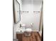 A well-lit bathroom featuring a stylish sink and a modern shower at 95 Mccoy Dr, Carrollton, GA 30116