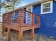 The wooden deck features stylish railings and provides outdoor space at 95 Mccoy Dr, Carrollton, GA 30116