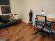 A brightly lit office with wood floors and a functional workspace at 95 Mccoy Dr, Carrollton, GA 30116
