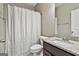 Bathroom with shower and granite vanity at 70 Pacific Ave, Sharpsburg, GA 30277
