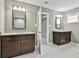 Bathroom features tile flooring, granite counters, and a doorway for easy access at 70 Pacific Ave, Sharpsburg, GA 30277