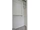 This closet includes chrome bars and multiple levels of shelving at 70 Pacific Ave, Sharpsburg, GA 30277