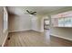 Spacious living room featuring hardwood floors and a ceiling fan at 11953 Brown Bridge Rd, Covington, GA 30016