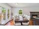 Bright dining room features a large wooden table and ample seating for entertaining at 2955 Peeksville Rd, Locust Grove, GA 30248