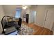 Home office featuring hardwood floors, neutral paint, a ceiling fan, and ample closet space at 303 Sedgewick Trl, Lawrenceville, GA 30044