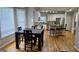 Dining Area next to a kitchen with stainless steel appliances at 303 Sedgewick Trl, Lawrenceville, GA 30044