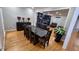 Open concept dining room flowing into a large living room at 303 Sedgewick Trl, Lawrenceville, GA 30044