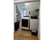 Convenient laundry room with modern appliances, ample storage space, and natural light at 303 Sedgewick Trl, Lawrenceville, GA 30044