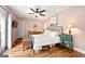 Bright and airy bedroom with wood floors and a ceiling fan at 2364 Woodside Way, Atlanta, GA 30341