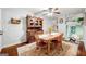 Charming dining room featuring wood furniture, a hutch, and natural light, perfect for Gathering meals at 2364 Woodside Way, Atlanta, GA 30341