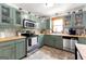 Stylish kitchen featuring stainless steel appliances, ample storage, and modern fixtures at 2364 Woodside Way, Atlanta, GA 30341