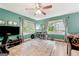 Inviting room with large windows, a drum set, TV and a cozy feel at 2364 Woodside Way, Atlanta, GA 30341