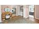 This stylish living room showcases a vanity, laundry, and an open doorway to the bathroom at 2364 Woodside Way, Atlanta, GA 30341