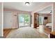 Cozy living room features wood floors, natural light, and access to the backyard at 2364 Woodside Way, Atlanta, GA 30341