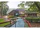 Exterior of a community building, featuring lush landscaping and a welcoming entrance at 783 Lost Creek Cir, Stone Mountain, GA 30088