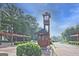 Clock tower and guard house at the neighborhood entrance, showcasing the community's character at 783 Lost Creek Cir, Stone Mountain, GA 30088