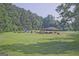 A lush green lawn leads to a pavilion in the park, perfect for outdoor activities and gatherings at 783 Lost Creek Cir, Stone Mountain, GA 30088