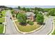 Aerial view of beautiful home with mature trees in a well kept neighborhood on a sunny day at 1979 Alcovy Shoals Blf, Lawrenceville, GA 30045