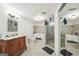 Bathroom featuring a decorative vanity, a large mirror, a walk-in shower and a soaking tub at 1979 Alcovy Shoals Blf, Lawrenceville, GA 30045