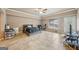 Spacious bedroom with neutral walls, large window, and door leading to the backyard at 1979 Alcovy Shoals Blf, Lawrenceville, GA 30045