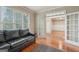 Inviting living room with hardwood floors and french doors leading to another room at 1979 Alcovy Shoals Blf, Lawrenceville, GA 30045