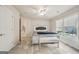 Bedroom with large windows, neutral walls and an ensuite bath located off of the room at 1979 Alcovy Shoals Blf, Lawrenceville, GA 30045
