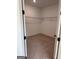 Walk-in closet featuring carpeted floor and wire shelving at 555 Discovery Lake Dr, Fayetteville, GA 30215